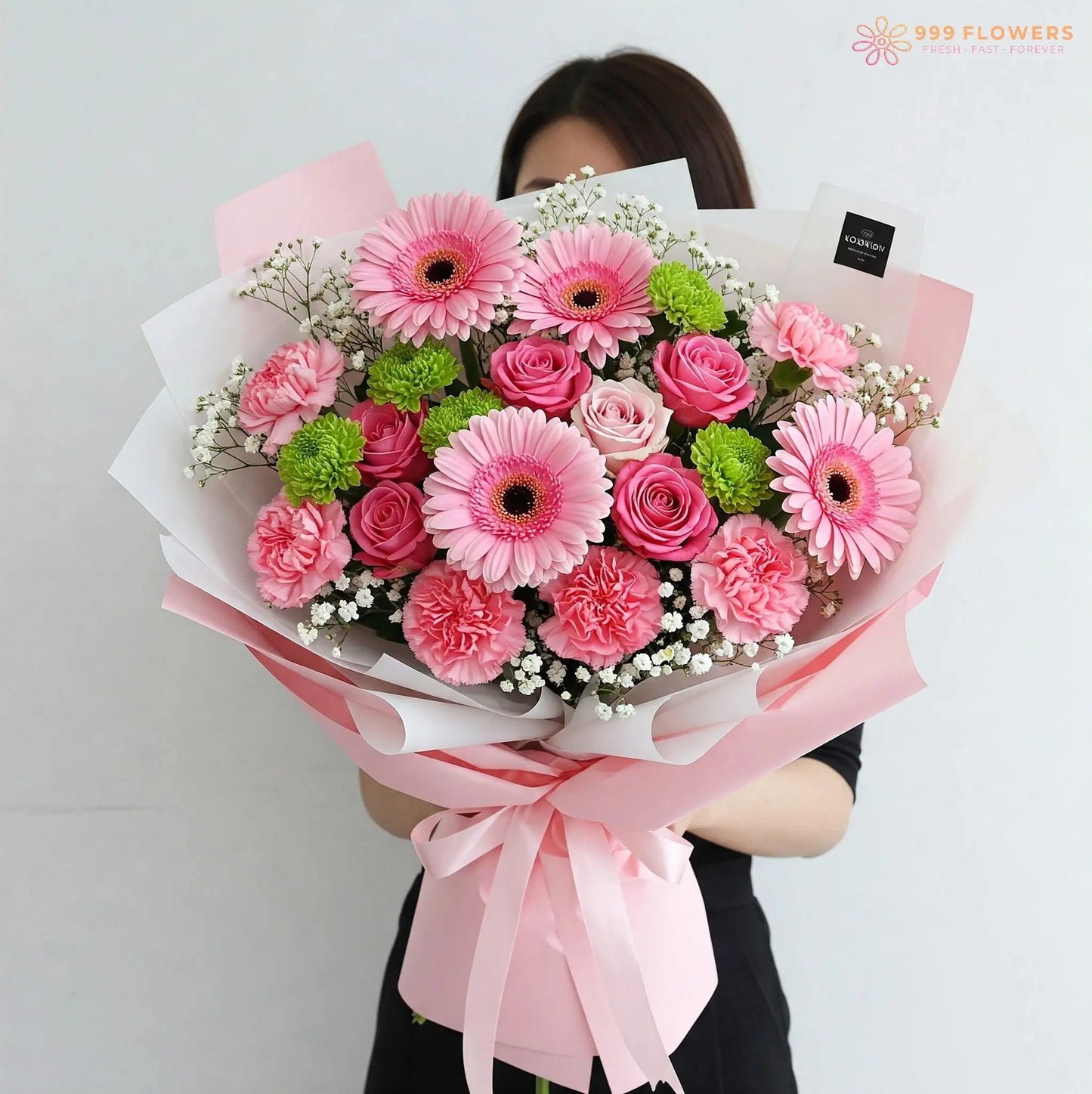Roseate Harmony Bouquet delivery Hong Kong: Pink gerberas, roses, and carnations with white and green fillers.