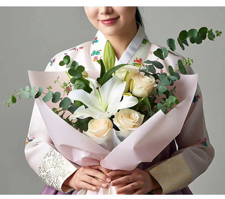 Elegant bouquet of white lily and champagne roses with eucalyptus leaves, delivered in Hong Kong