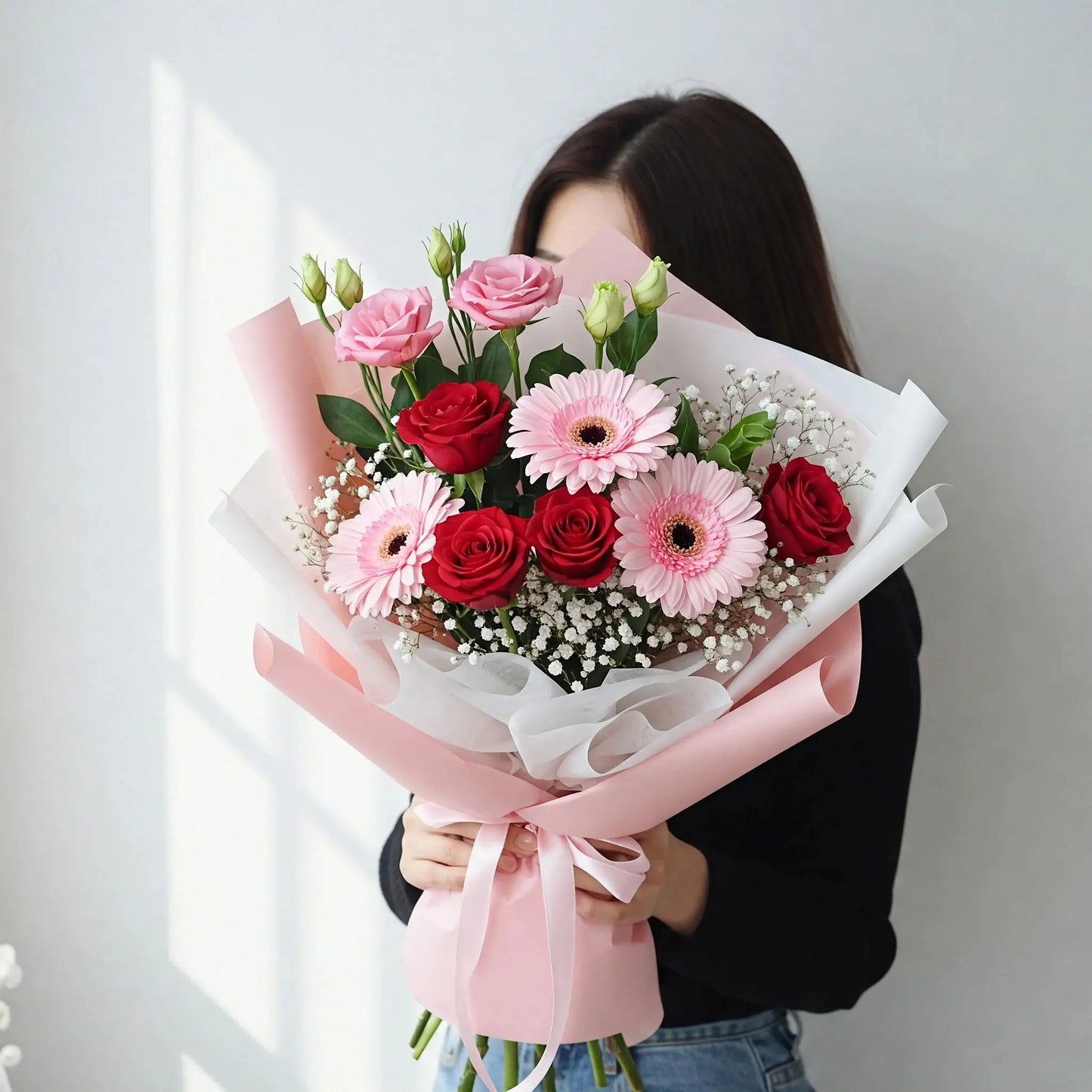 Enchanted Bloom bouquet delivery Hong Kong: Red roses, pink eustoma, pink gerberas, baby's breath, and green fillers