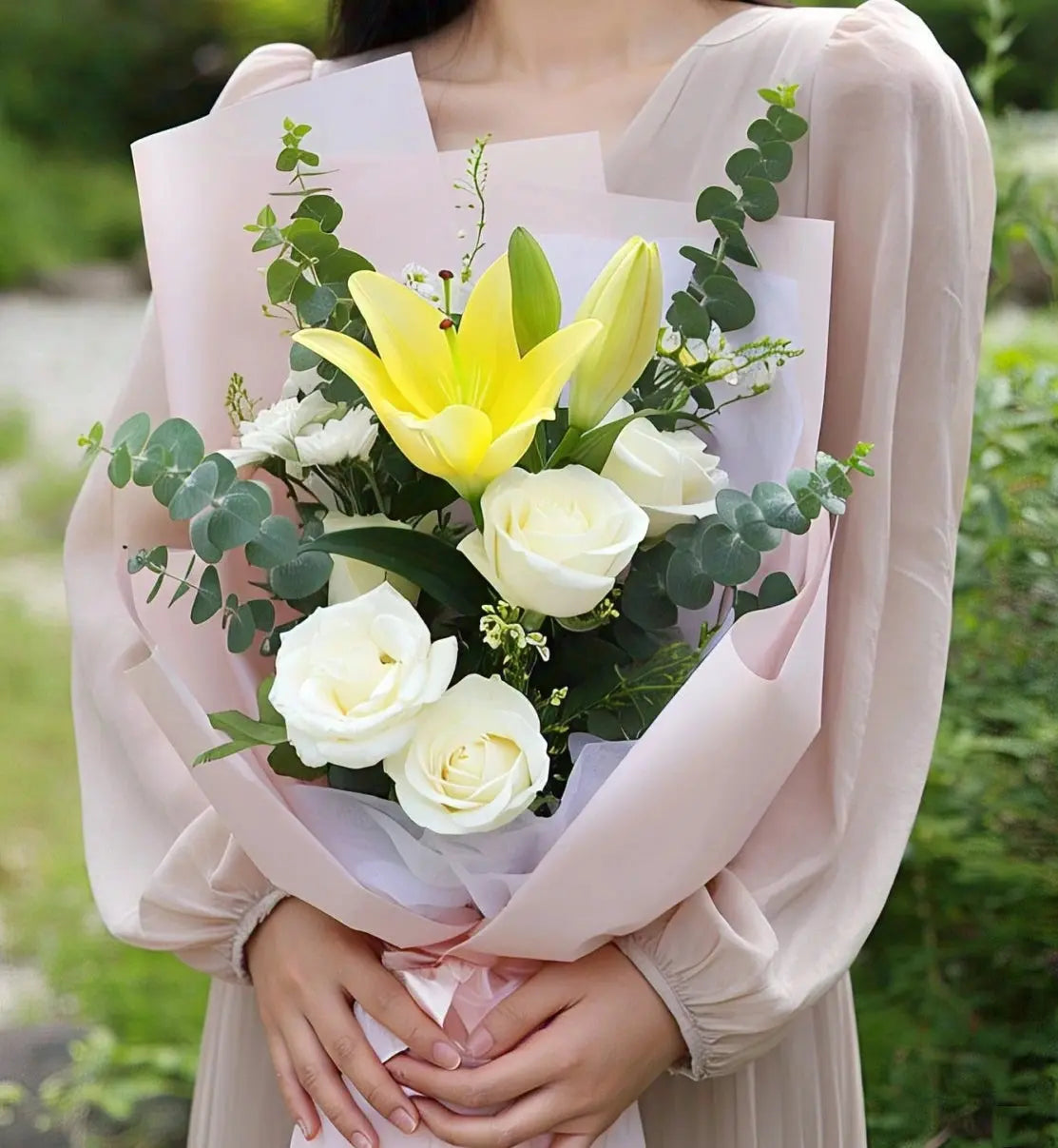 Elegant bouquet featuring three white roses, two yellow lilies, eucalyptus leaves, and white and green fillers, available for flower delivery in Hong Kong.